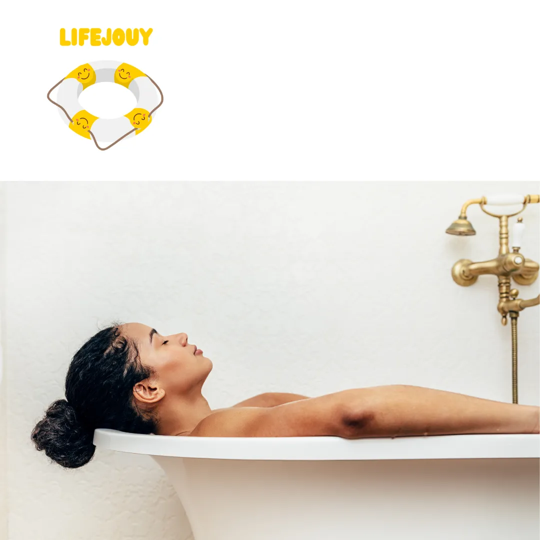 A woman relaxing in a roll-top bath